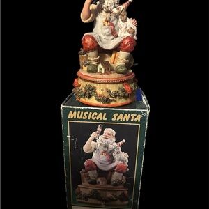 Festive Musical Santa Figurine with Red and White Accents